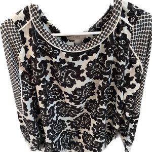 The Loft black and white lightweight material medium ladies long sleeve blouse.